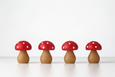still life image of wooden mushrooms on whiteの写真素材