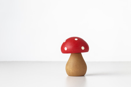still life image of wooden mushrooms on whiteの写真素材