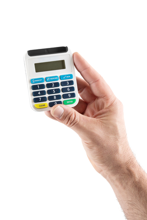 Single man's hand holding a pin card pinsentry reader to identify card user