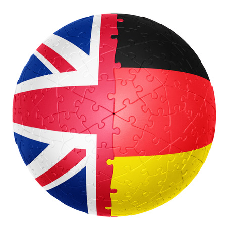 Jigsaw ball one half is the united kingdom flag the other half is the Germany flag 3D illusionsの写真素材