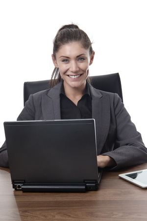business woman working at her desk in the officeの写真素材