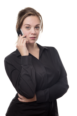 young business woman talking on her mobile phone の写真素材