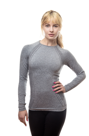 blonde hair woman wearing a grey gym top ready for the gymの写真素材