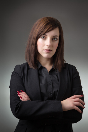 young business woman looking at cameraの写真素材