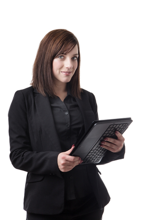 business woman using a laptop shot in the studioの写真素材