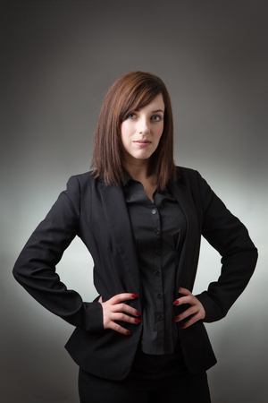 young business woman looking at cameraの写真素材