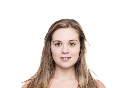 beauty head shot of young woman looking at camreaの写真素材