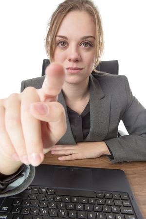 business woman sitting a a desk with a laptop computer in front of her point of view from the screenの写真素材