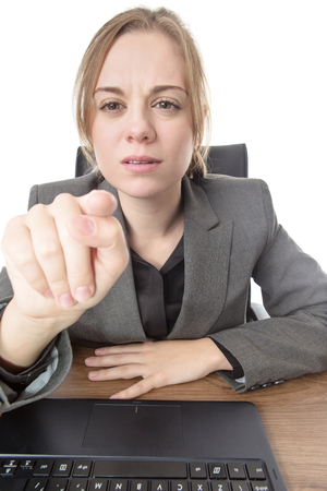 business woman sitting a a desk with a laptop computer in front of her point of view from the screenの写真素材