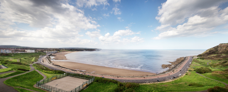 panoramic seascape of scarborough beachの写真素材