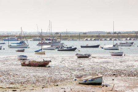 landscape image of boats on the sea taken from west mersea in essex englandの写真素材