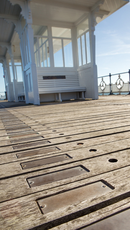 swanage pier showing lot of plaques with engraved with a messagesの写真素材