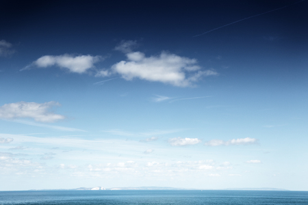 looking out at the ocean at the beauty of natureの写真素材