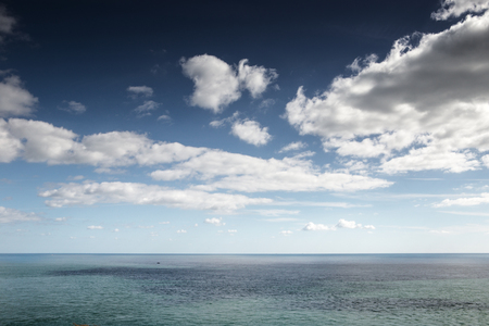 looking out at the ocean at the beauty of natureの写真素材