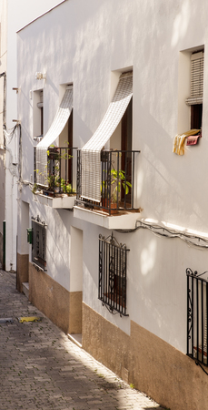 street and houses of old town in almunecar province of Granada in spainの写真素材