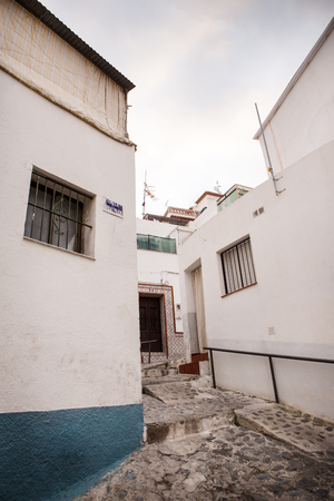 street and houses of old town in almunecar province of Granada in spainのeditorial素材