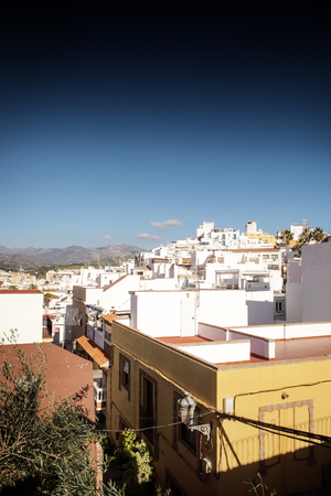 looking out across rooftops in from old town in almunecar spainの写真素材