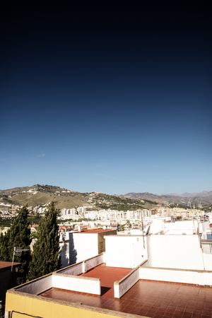 looking out across rooftops in from old town in almunecar spainの写真素材
