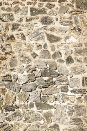 old stone wall wall background backdrop closeupの写真素材