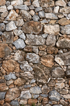 old stone wall wall background backdrop closeupの写真素材