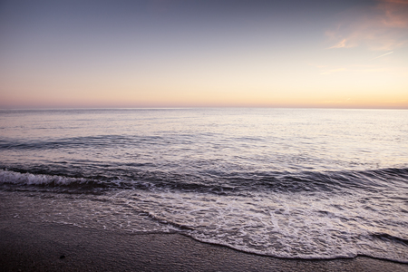 landscape of the sea and beach as the sun is setting in the costa tropical almunecar spainの写真素材