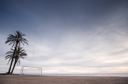 goal post on a beach in almunecar spain at duskの写真素材