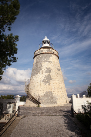 Faro De La Herradura in almunecar originally built as a watchtower and was converted to a lighthouse in 1992. It was built as a reinforcement of the coastal defensesの写真素材