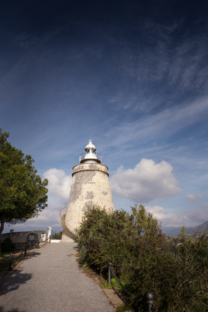 Faro De La Herradura in almunecar originally built as a watchtower and was converted to a lighthouse in 1992. It was built as a reinforcement of the coastal defensesの写真素材