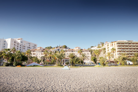 equipment for paragliding and hand gliding be packed away after a flight to a beach in Almunecar spainの写真素材