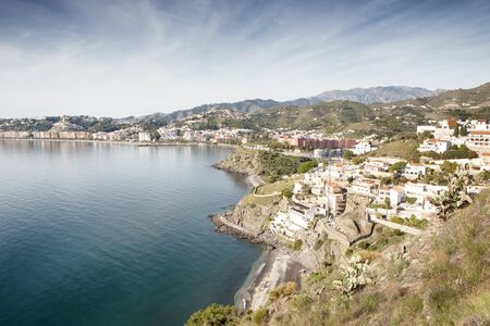 landscape of building and sea in almunecar spainの写真素材