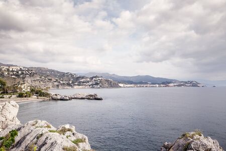 landscape of building and sea in almunecar spainの写真素材