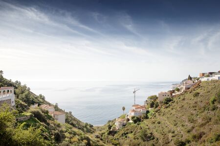 landscape of building and sea in almunecar spainの写真素材