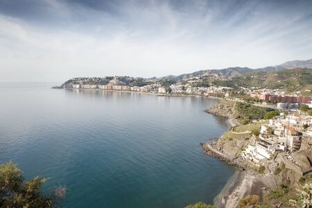 landscape of building and sea in almunecar spainの写真素材