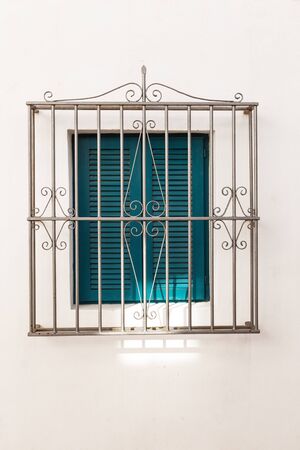 single window down a side street in almunecar spainの写真素材