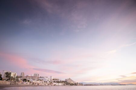 seascape landscape shot in benalmadena with the cityscape distantの写真素材