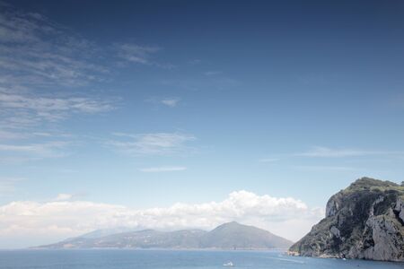 view of mount vesuvius across the sea from the island of capri