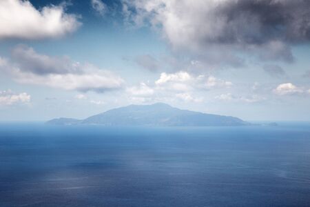 view of mount vesuvius across the sea from the island of capriの写真素材