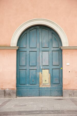 large door set in a building in italyの写真素材