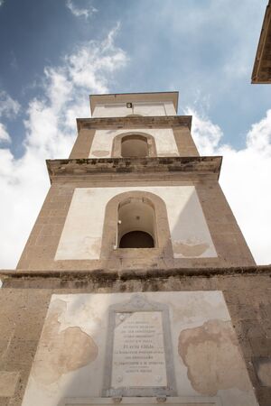 looking up at the bell tower of the church in positano italyの写真素材