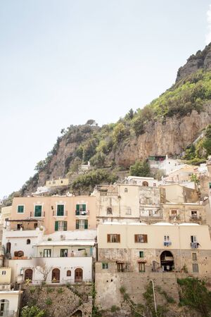 looking up the hillside at house in the italian village positanoの写真素材