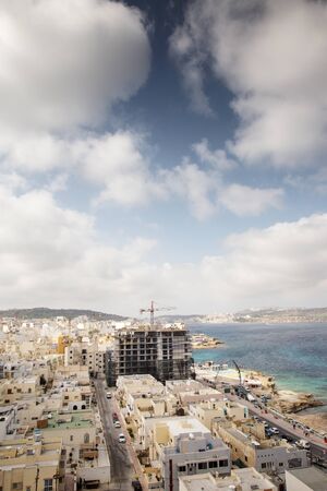 landscape view of a cityscape malta of all the high rise buildingsの写真素材