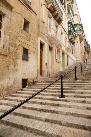 building and architecture of  the side streets of Valletta the capital city of maltaの写真素材
