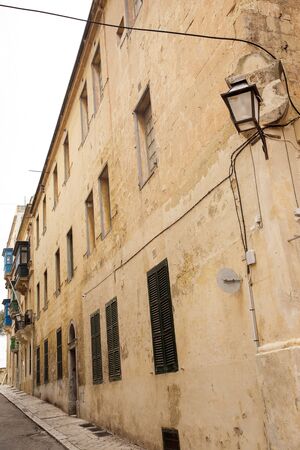 building and architecture of  the side streets of Valletta the capital city of maltaの写真素材