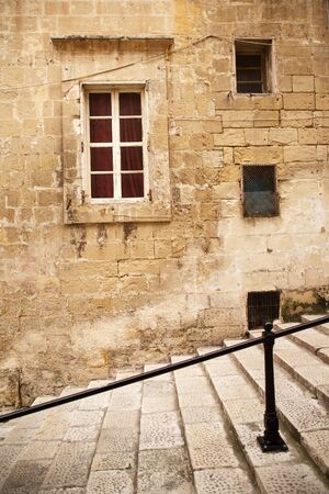 building and architecture of  the side streets of Valletta the capital city of maltaの写真素材