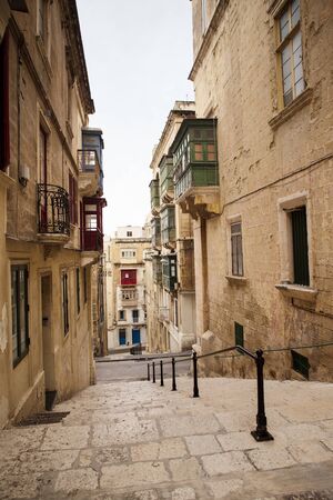 building and architecture of  the side streets of Valletta the capital city of maltaの写真素材