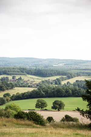 hill top view looking down on the surrey countrysideの写真素材