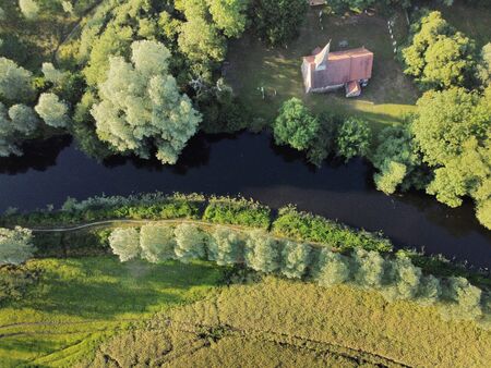 aerial view of All Saints Church in Ulting a small chruch next to the river chelmer in essexの写真素材