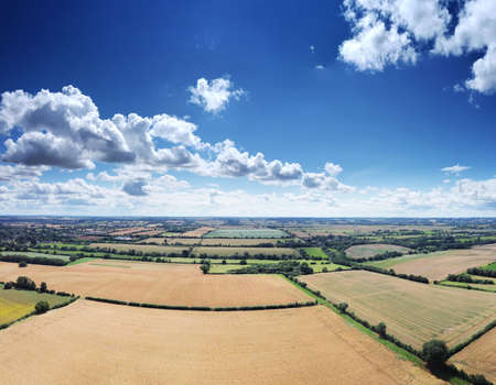 Panoramic aerial view of farmland in the oxfordshire countryside in englandの写真素材