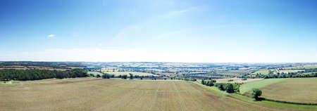 panoramic aerial view landscape image of the Whispering Knights part of the rollright stone in the Oxfordshire Warwickshire border in Englandの写真素材