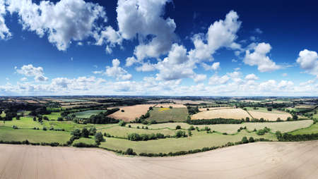 Panoramic aerial view of farmland in the oxfordshire countryside in englandの写真素材